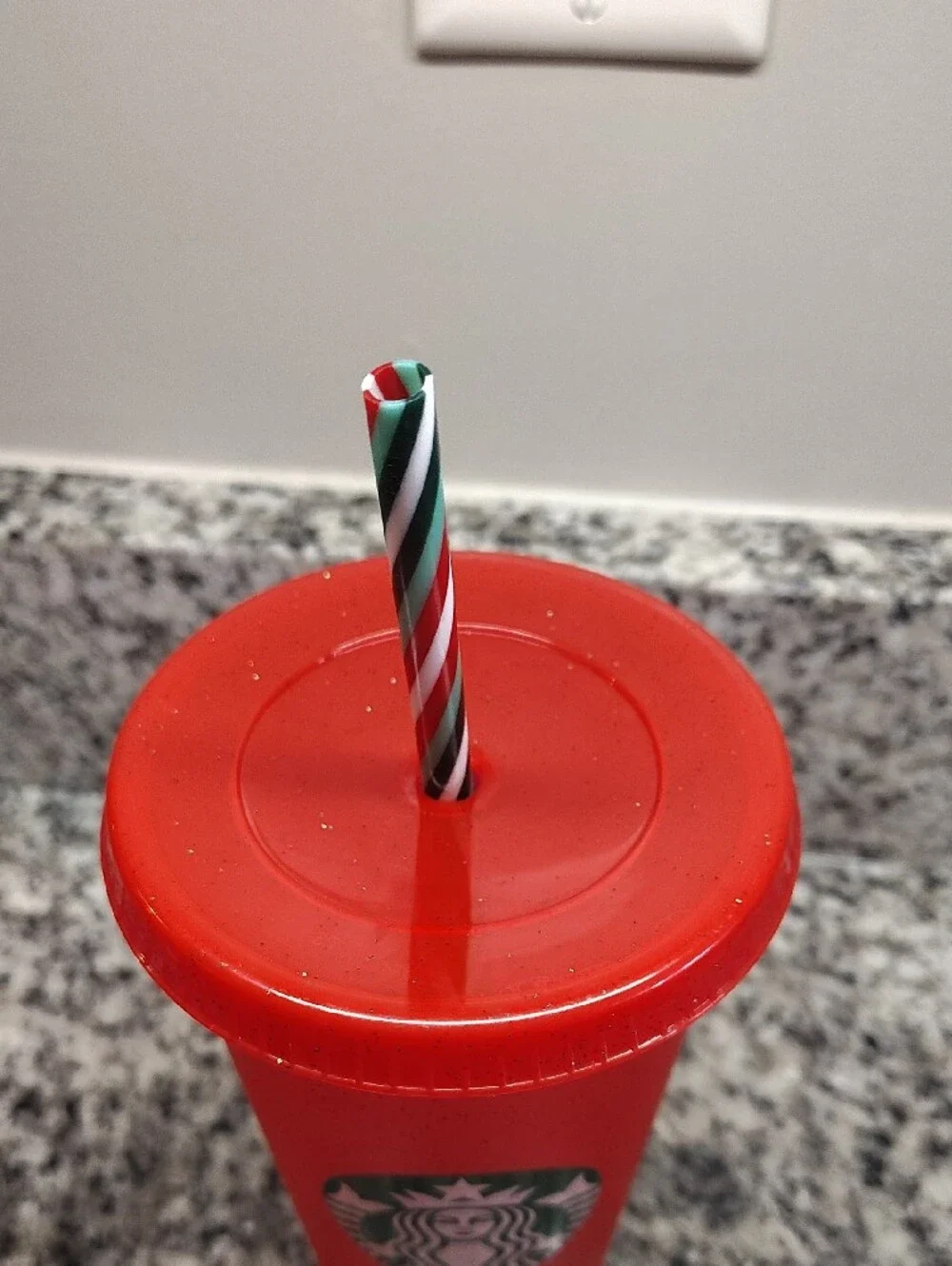 Starbucks Red Tumbler with Green Logo and Striped Straw